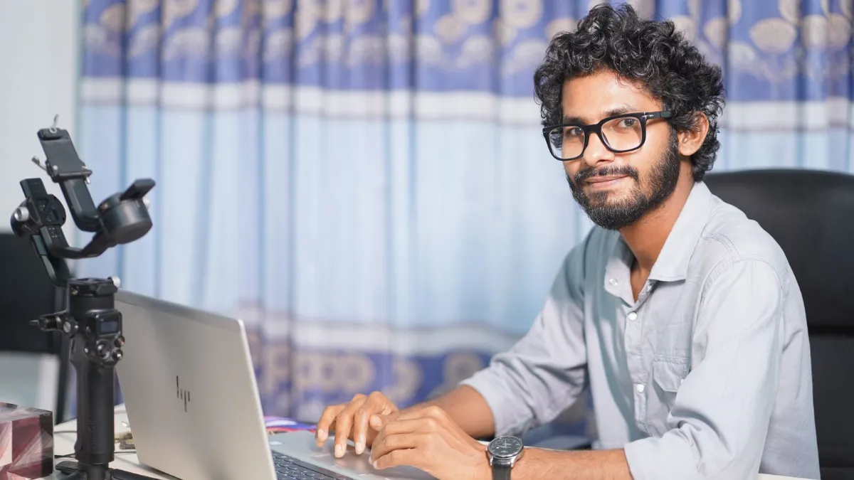 Web developer building a responsive business website on a laptop